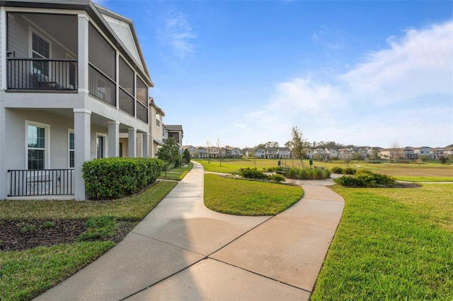 view of community featuring a yard