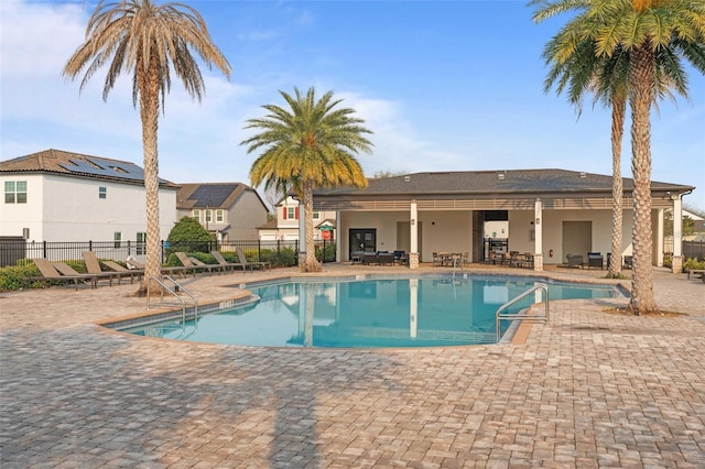 view of swimming pool with a patio