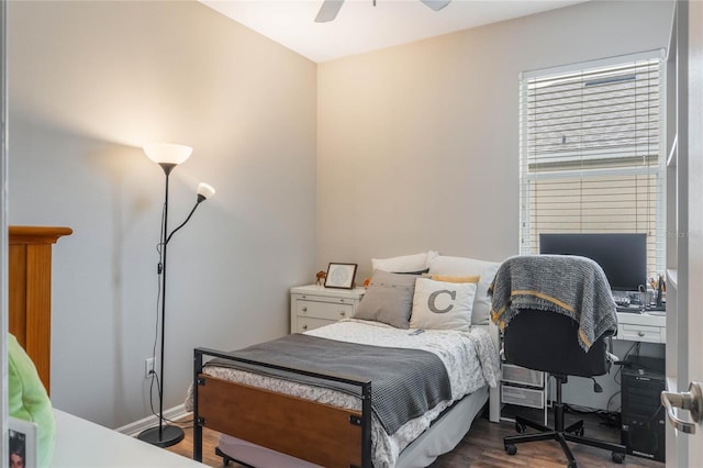 bedroom with ceiling fan and wood finished floors