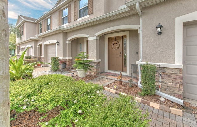 property entrance with a garage