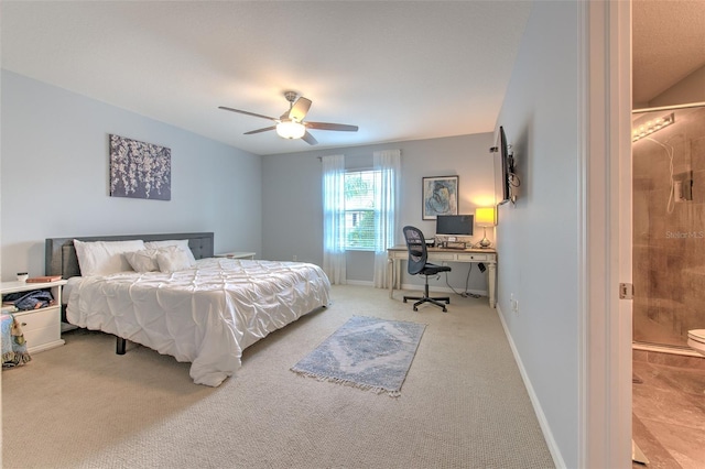 bedroom with ceiling fan and carpet floors