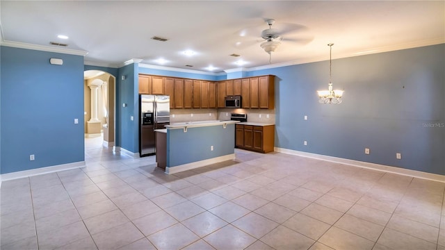 kitchen with appliances with stainless steel finishes, pendant lighting, crown molding, a center island, and ceiling fan with notable chandelier