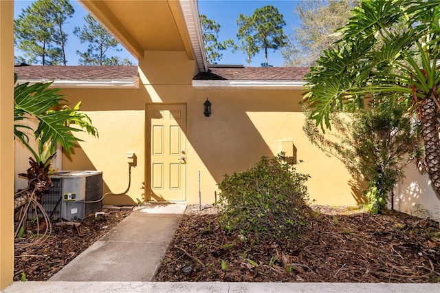 doorway to property with cooling unit