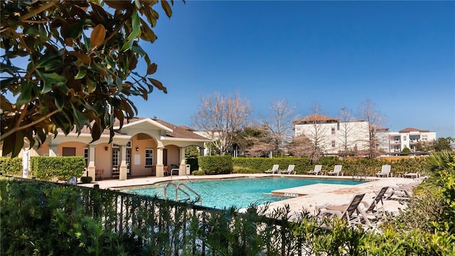 view of pool featuring a patio