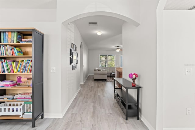 corridor featuring light hardwood / wood-style floors