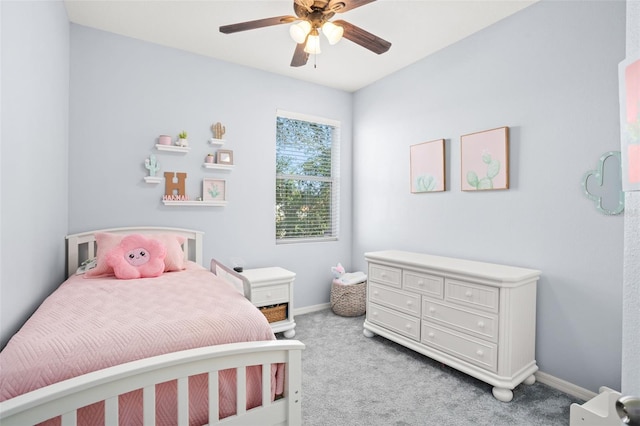 bedroom with light carpet and ceiling fan