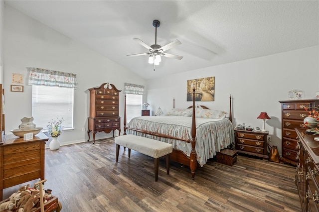 bedroom with ceiling fan, a textured ceiling, dark wood-type flooring, baseboards, and vaulted ceiling