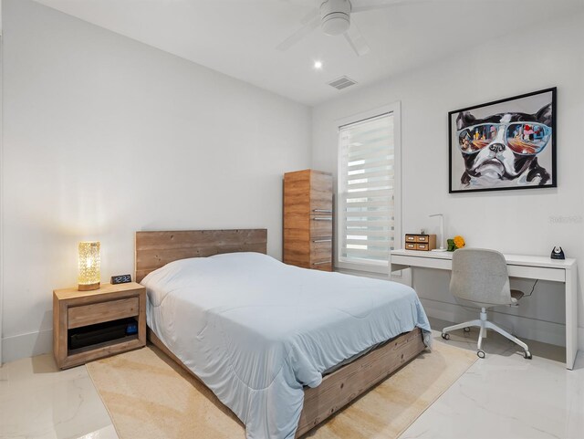 bedroom featuring marble finish floor, visible vents, ceiling fan, and baseboards