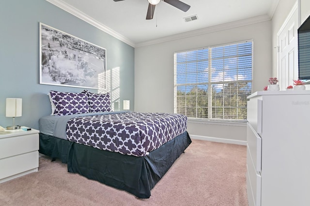 bedroom featuring baseboards, visible vents, ornamental molding, and light colored carpet