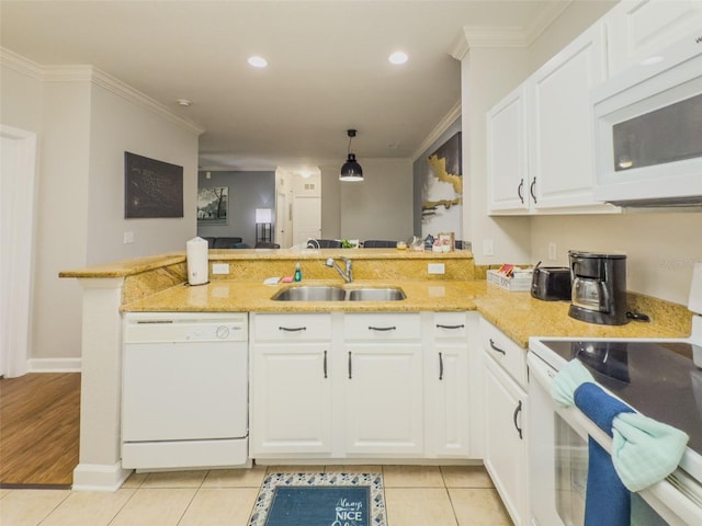 8000 Tuscany Way Unit 4405, Davenport, FL 33896 - kitchen featuring white appliances, a peninsula, ornamental molding, white cabinets, and light stone countertops