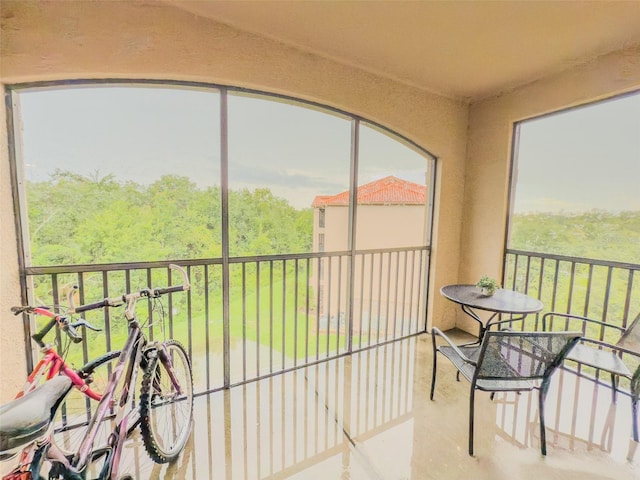 8000 Tuscany Way Unit 4405, Davenport, FL 33896 - sunroom with a forest view
