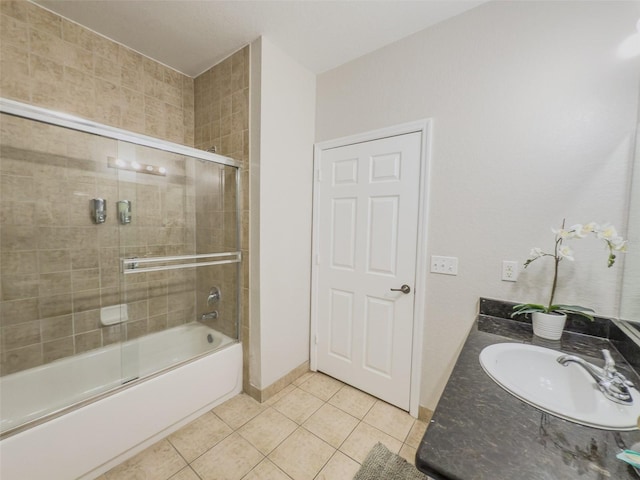 8000 Tuscany Way Unit 4405, Davenport, FL 33896 - full bath with tile patterned floors, bath / shower combo with glass door, and vanity