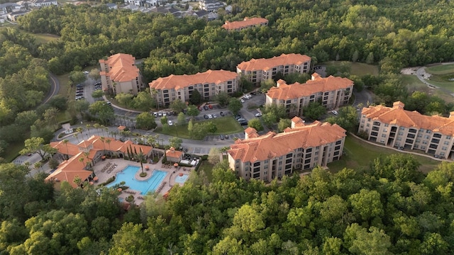 8000 Tuscany Way Unit 4405, Davenport, FL 33896 - drone / aerial view of a pool area and a forest