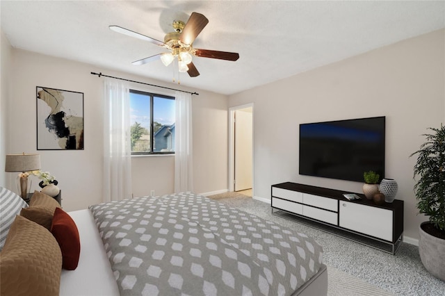 bedroom with light carpet and ceiling fan