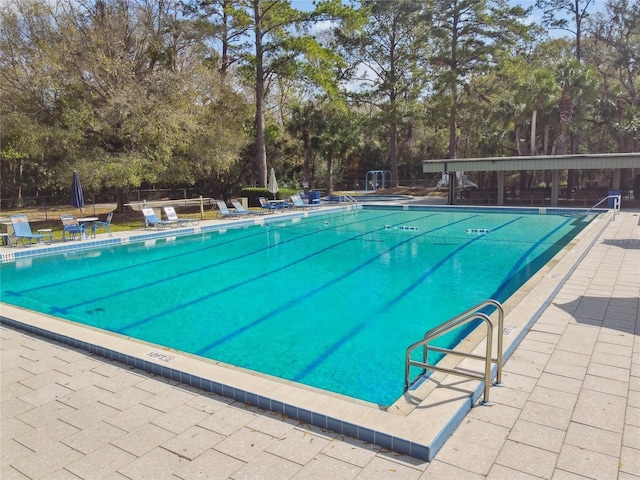 view of pool featuring a patio