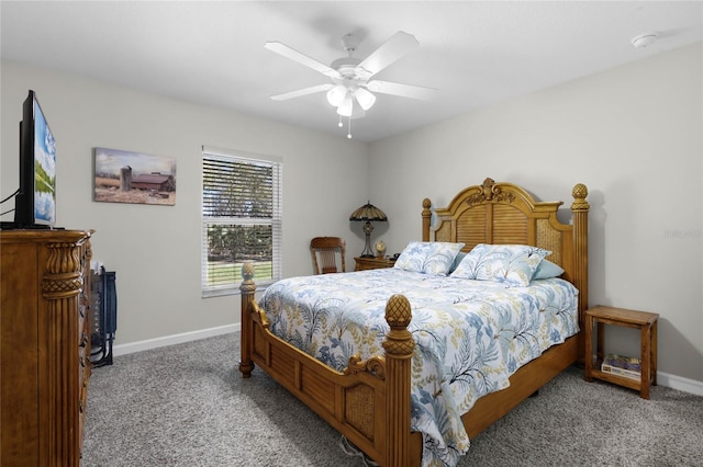 carpeted bedroom featuring ceiling fan and baseboards