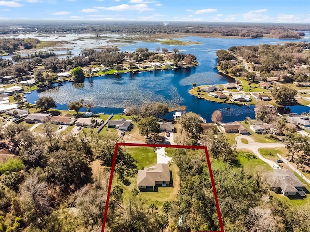 aerial view with a water view and a residential view