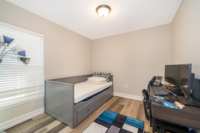 bedroom featuring light hardwood / wood-style floors