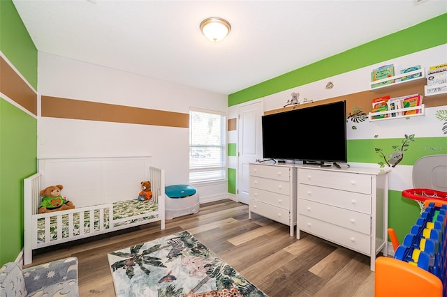bedroom featuring dark wood-type flooring