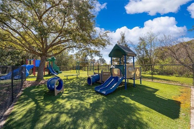 view of jungle gym featuring a yard
