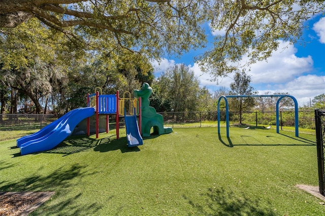 view of playground with a yard