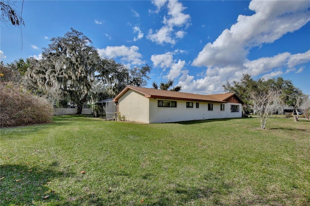 exterior space with a lawn