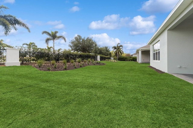 view of yard with fence
