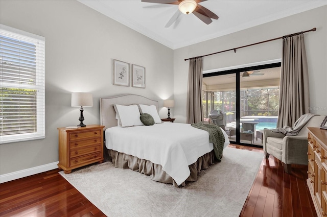 bedroom featuring access to outside, ornamental molding, dark wood-style flooring, and baseboards