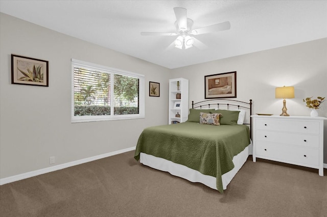 bedroom featuring ceiling fan, dark carpet, and baseboards