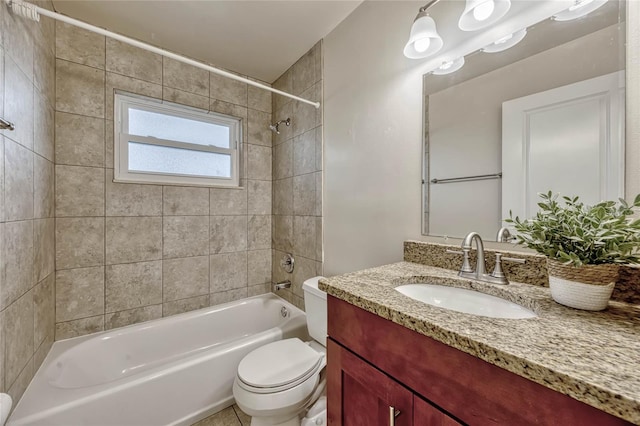 full bathroom featuring tub / shower combination, vanity, and toilet