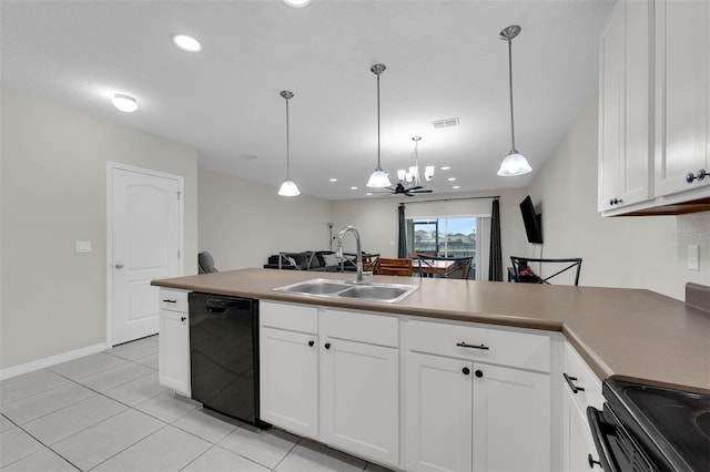 kitchen with pendant lighting, light countertops, white cabinetry, a sink, and dishwasher