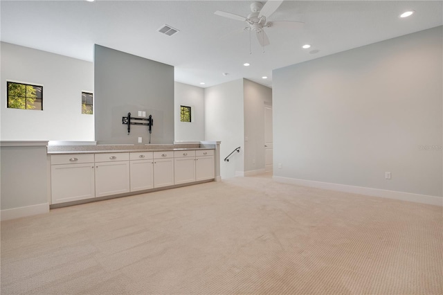 bathroom featuring ceiling fan