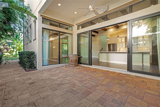 view of patio / terrace with ceiling fan