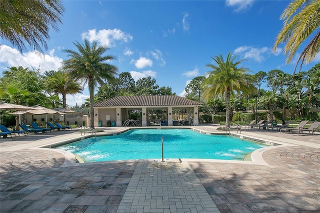 view of pool featuring a patio and a gazebo