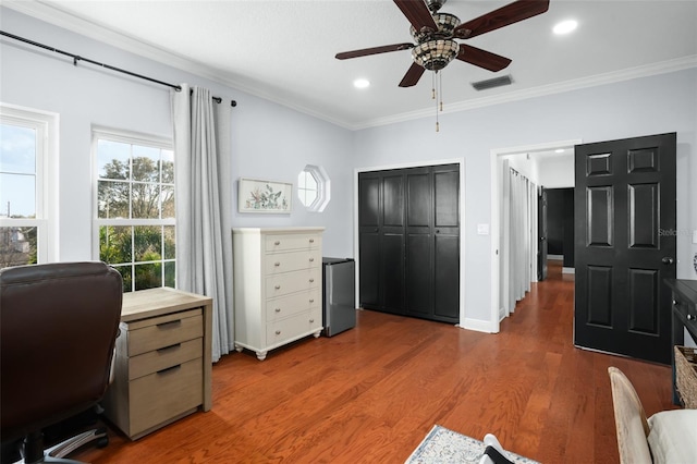 home office featuring recessed lighting, wood finished floors, visible vents, and ornamental molding