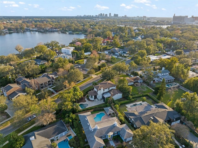 birds eye view of property featuring a water view