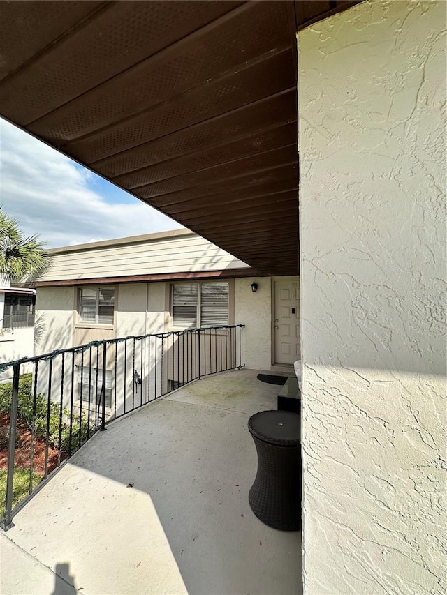 view of patio / terrace featuring a balcony