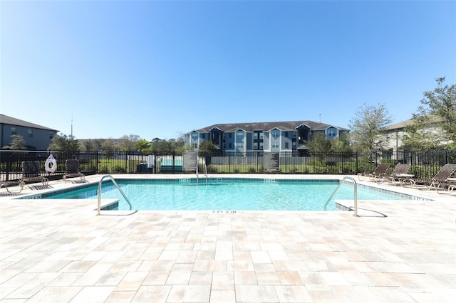 pool featuring fence