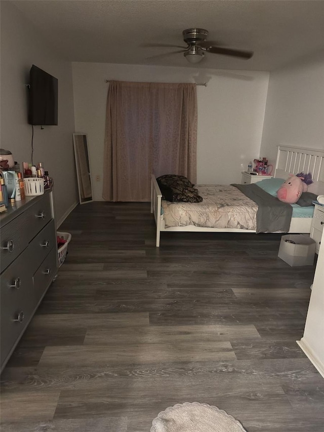 5951 Village Cir Unit Ge, Orlando, FL 32822 - bedroom featuring dark wood finished floors and ceiling fan