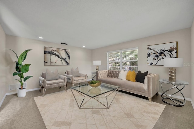 living room with recessed lighting, visible vents, light carpet, and baseboards