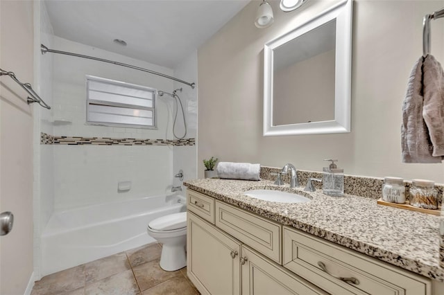 full bath featuring shower / bathtub combination, vanity, toilet, and tile patterned floors