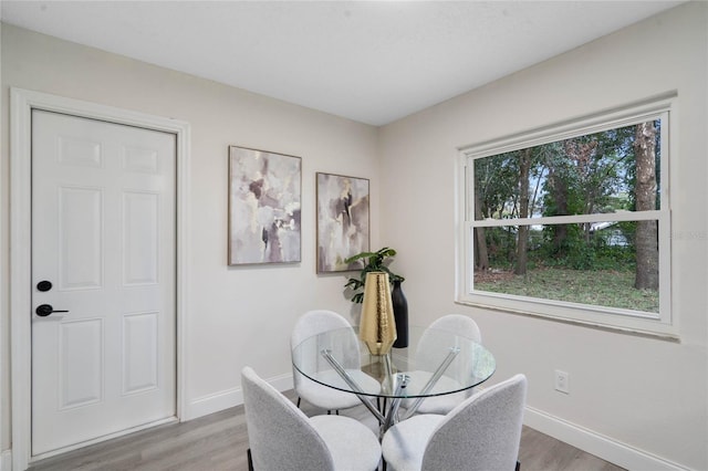 dining area featuring light wood-type flooring