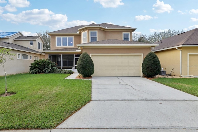 view of front of house with a garage, concrete driveway, a front lawn, and stucco siding