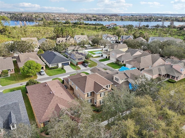 aerial view featuring a water view and a residential view