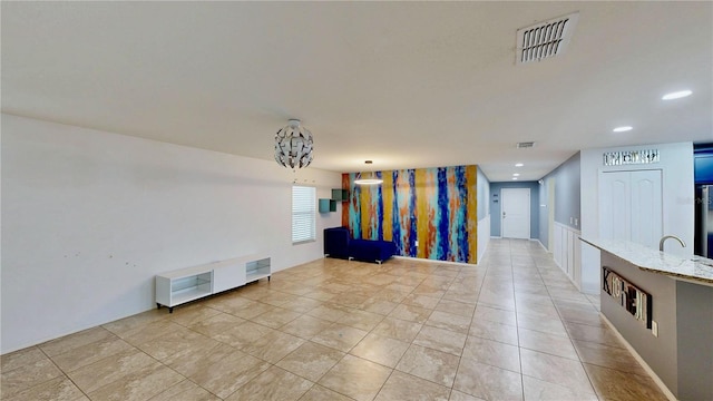 interior space with recessed lighting, visible vents, and light tile patterned floors