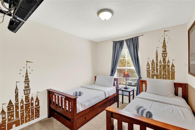 carpeted bedroom with a textured ceiling