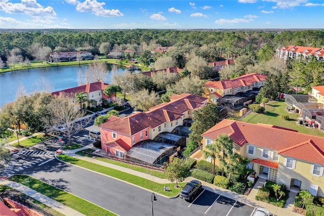 aerial view featuring a water view and a residential view