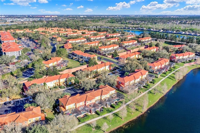 aerial view with a water view and a residential view