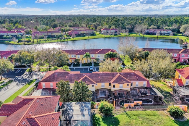 aerial view featuring a residential view and a water view