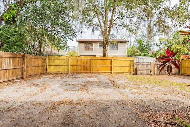 view of yard with a fenced backyard